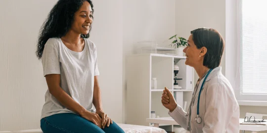 A patient talking with her GP